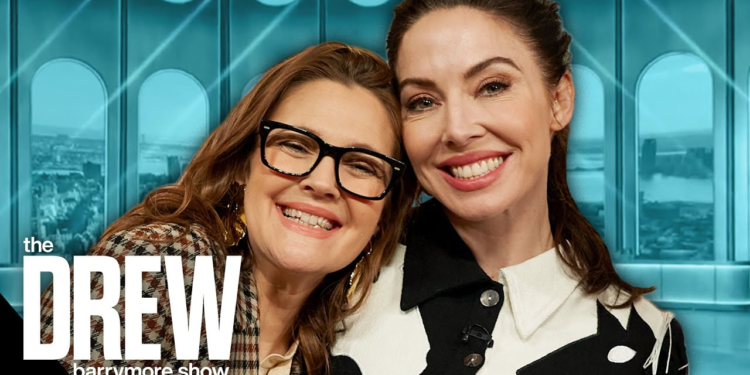 Whitney Cummings and Drew Barrymore sharing a moment during the show.